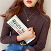 “Women’s Retro Red Turtleneck Sweater”